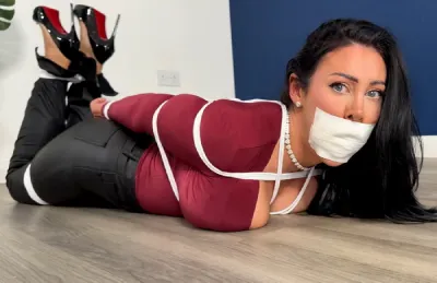 Mila Amora – Intruder ties Mila Amora stuffs and fucks her face