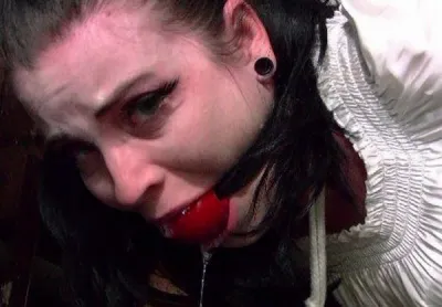 Sybil – The pretty brunette had to spend the night hogtied in rubble