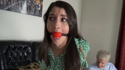 Arielle Lane – Secretary Arielle in a tightly arching hogtie